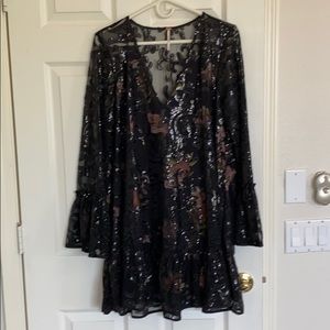 Free People oversized sequin mini dress.